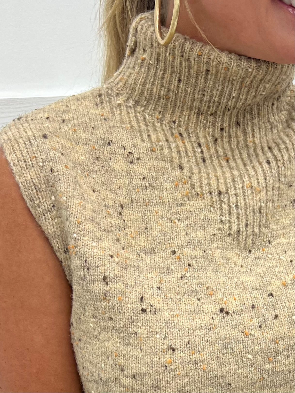 First Class Sleeveless Sweater