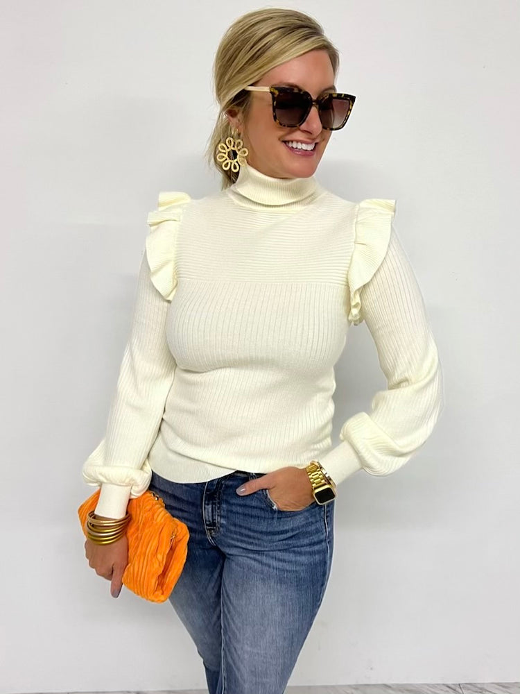 
                      
                        Tinsley Ruffle Turtle Neck (Ivory)
                      
                    