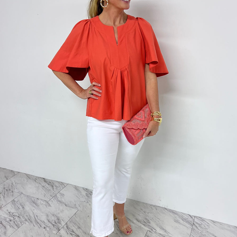 
                  
                    Karis Coral V.Neck Top
                  
                