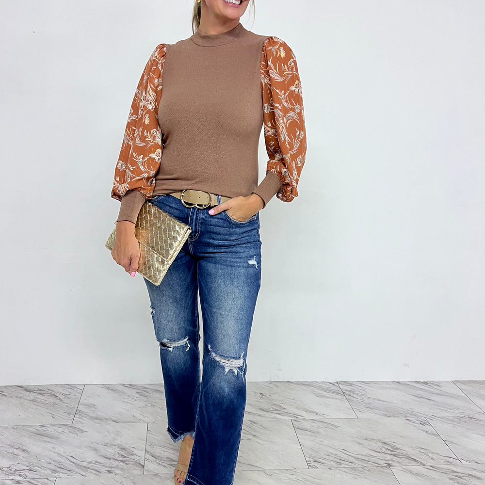 
                      
                        Edith Flower Sleeve Top
                      
                    