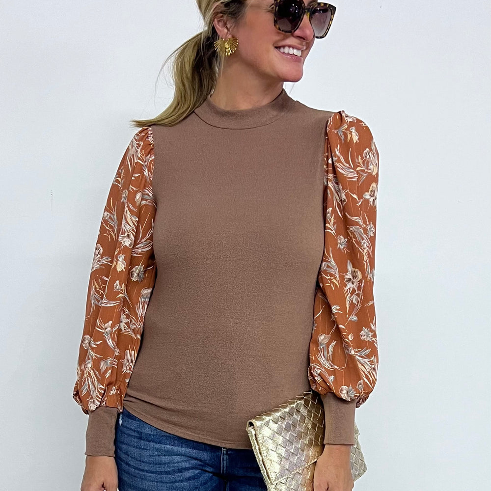 
                      
                        Edith Flower Sleeve Top
                      
                    