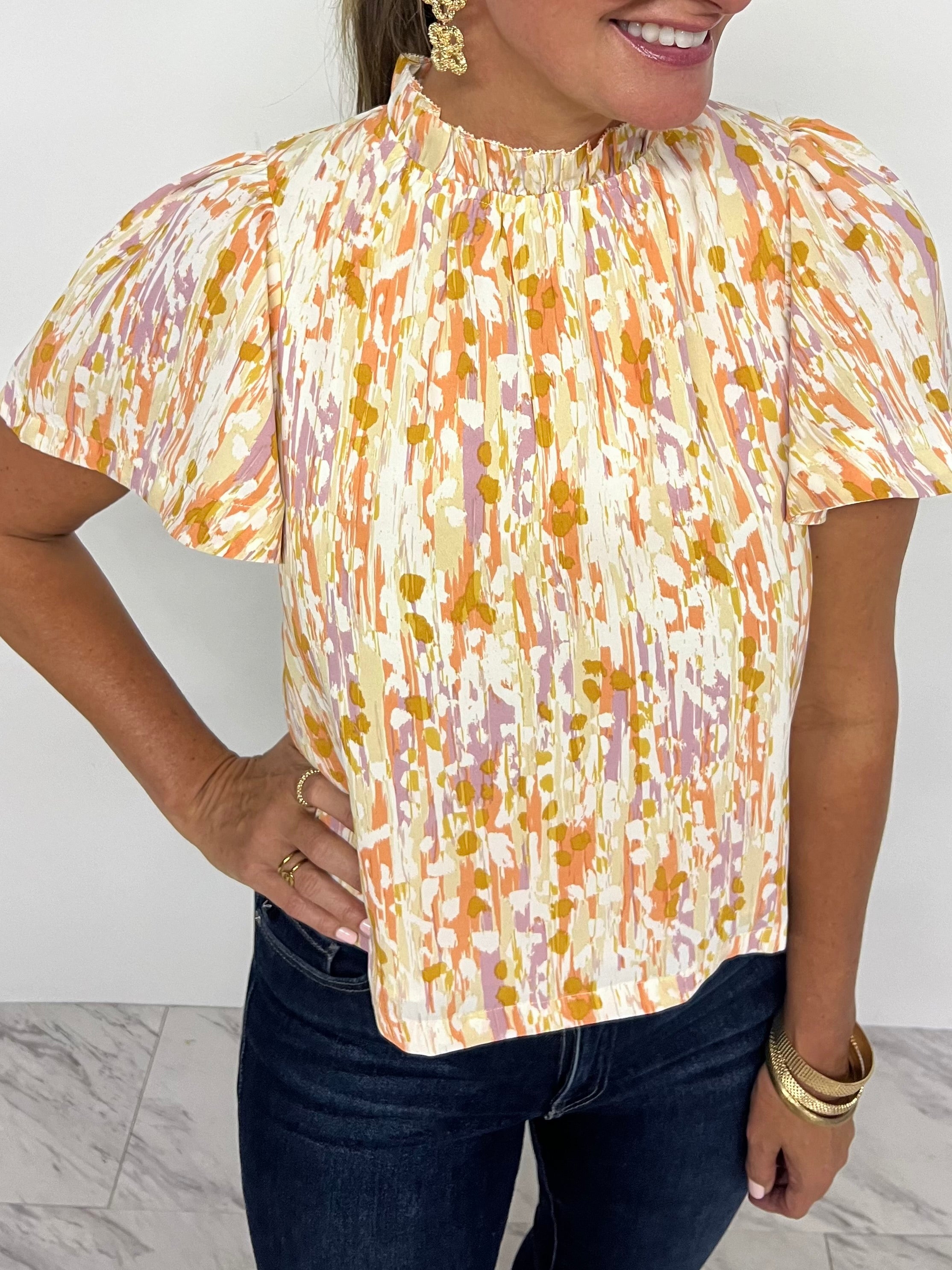 yellow flutter sleeve top