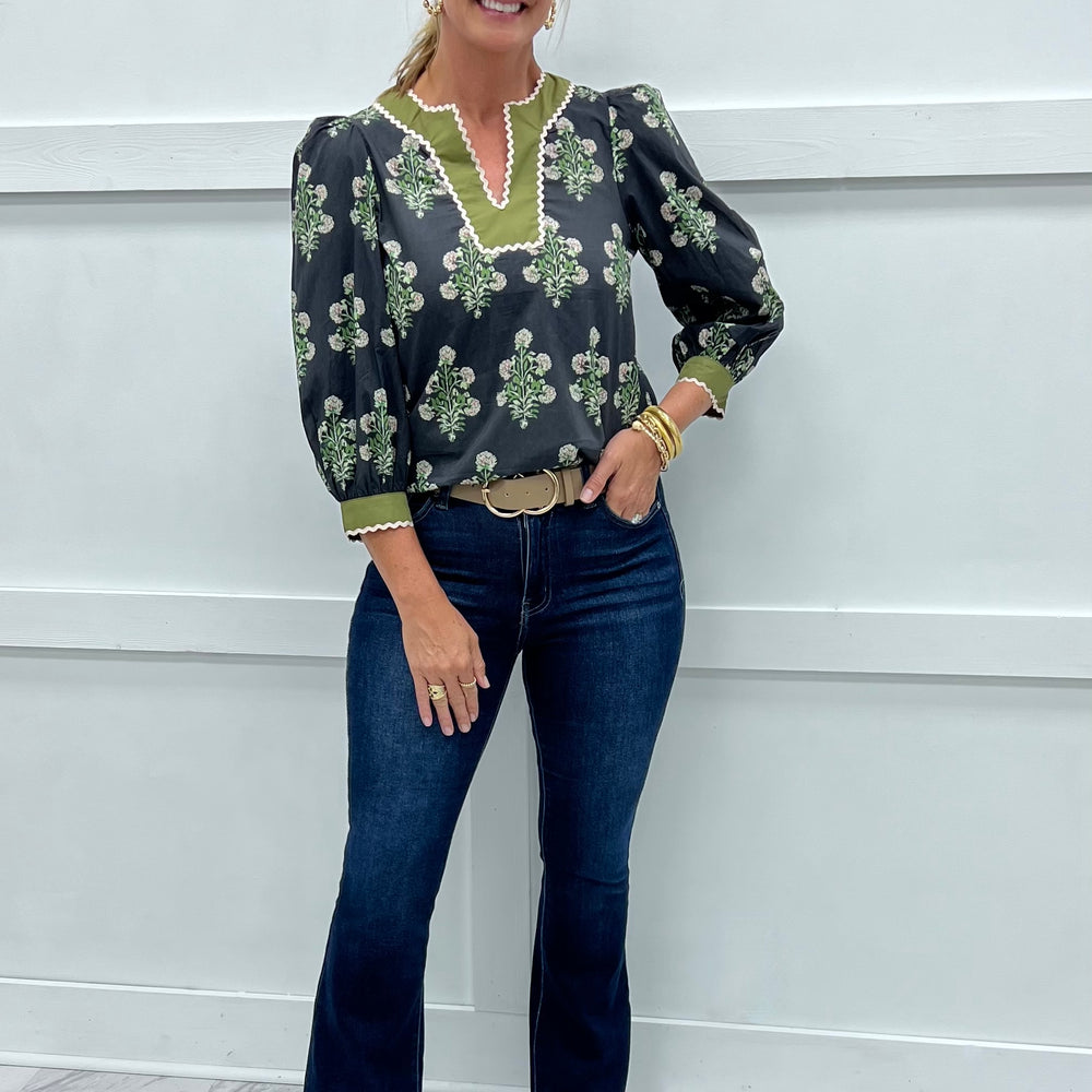 
                  
                    Charmed Print V.Neck Top
                  
                