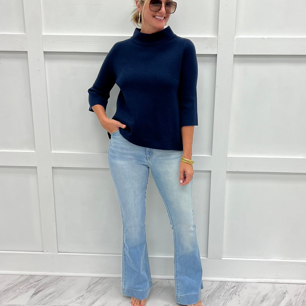 
                  
                    Estelle Navy Mock Neck Sweater
                  
                