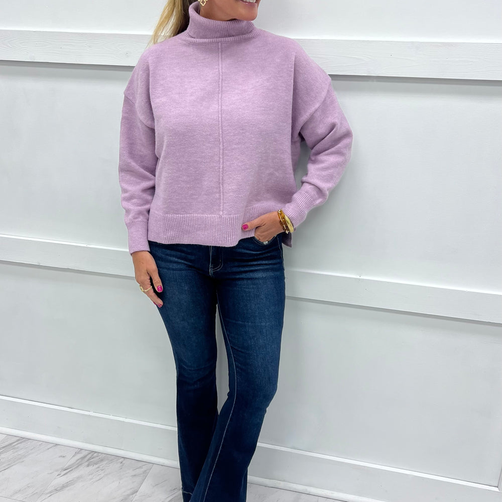 
                  
                    The Adler Turtleneck Sweater (Lavender)
                  
                