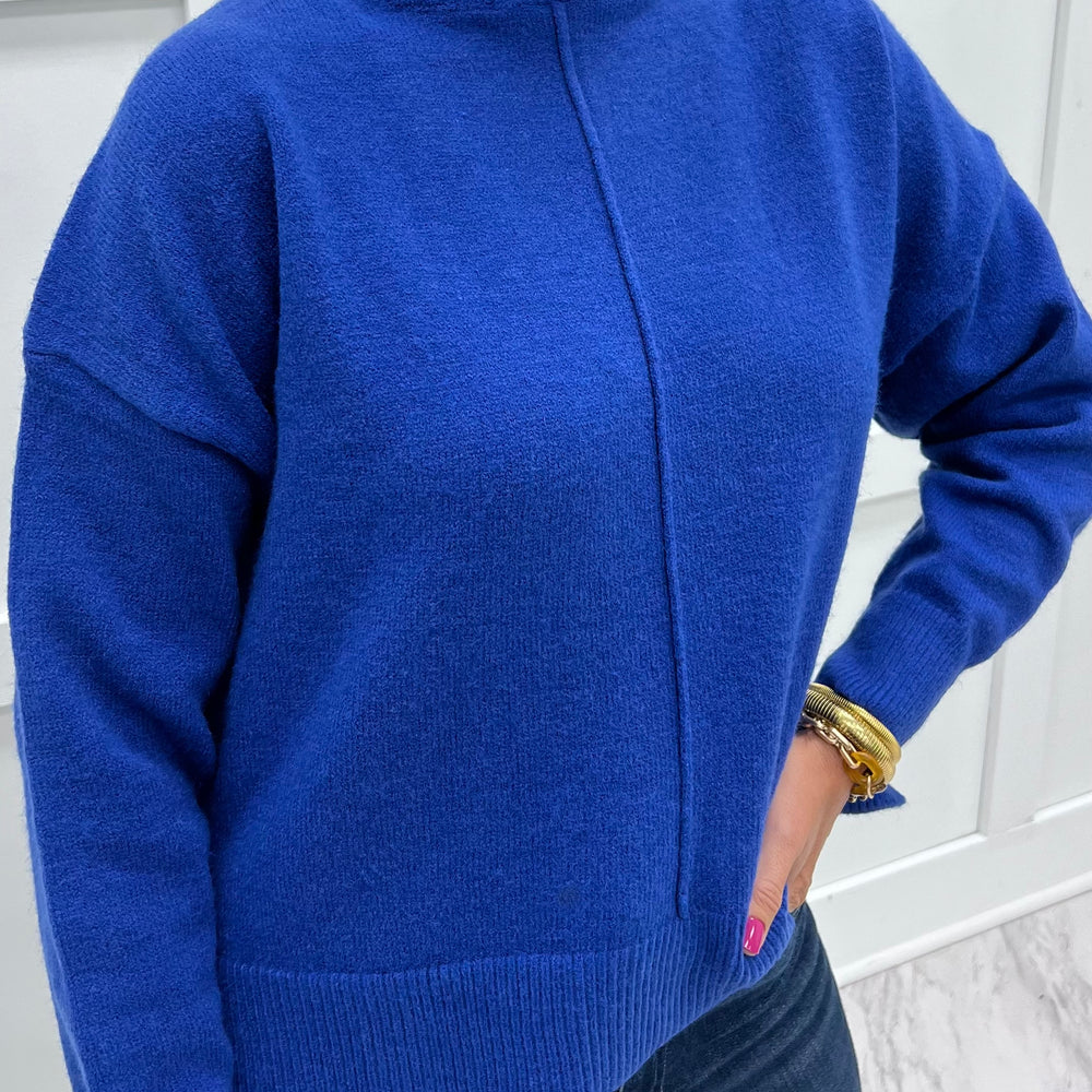 
                  
                    The Adler Turtleneck Sweater (Blue)
                  
                