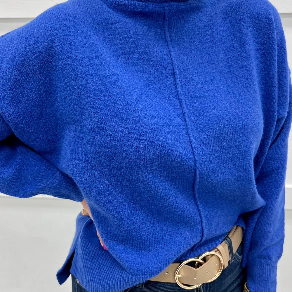 
                  
                    The Adler Turtleneck Sweater (Blue)
                  
                