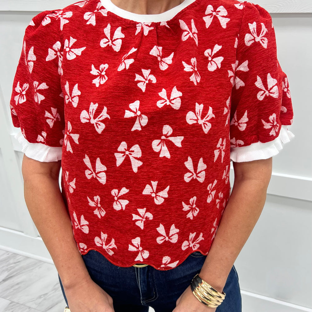 
                  
                    Wrapped In Red Bow Top
                  
                