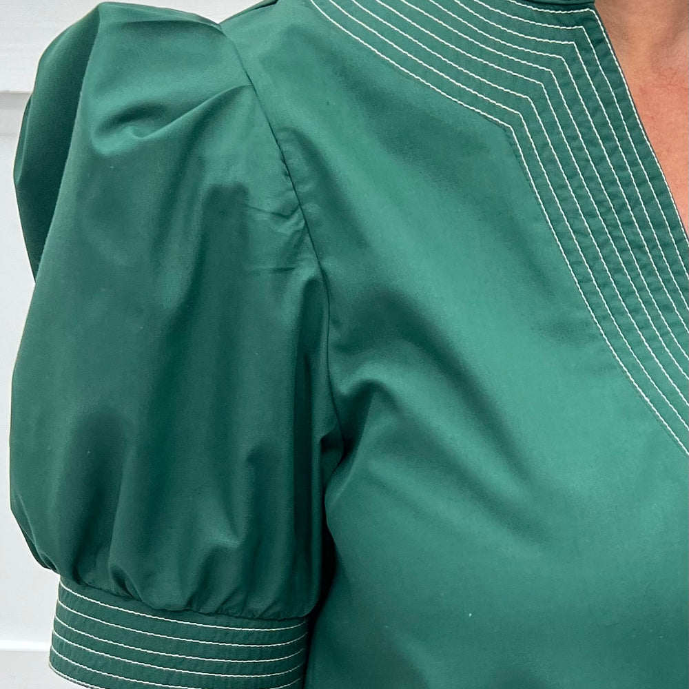 
                  
                    Hannah V.Neck Top (Hunter Green)
                  
                