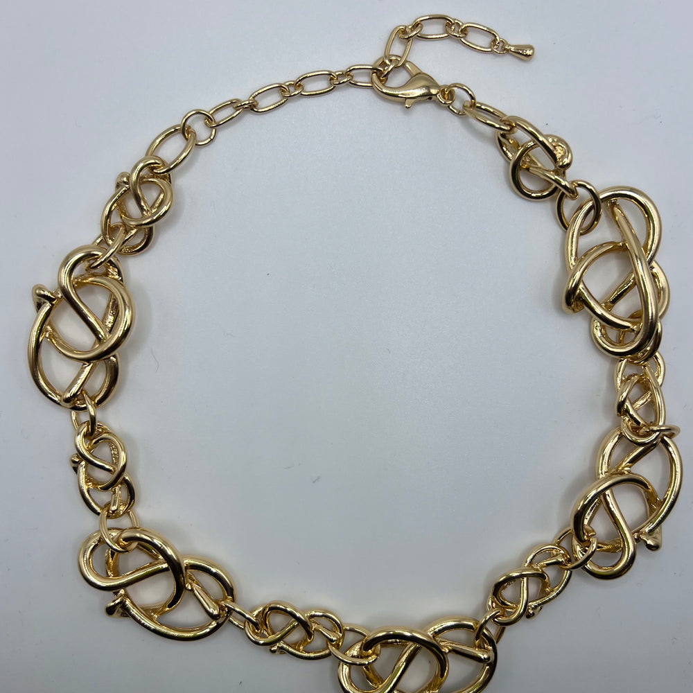 
                  
                    Golden Hour Knot Necklace
                  
                