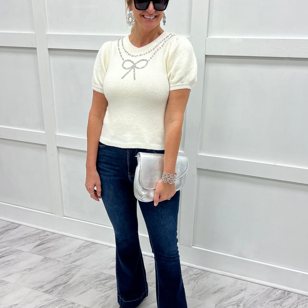 
                  
                    Revelry Rhinestone Bow Sweater
                  
                