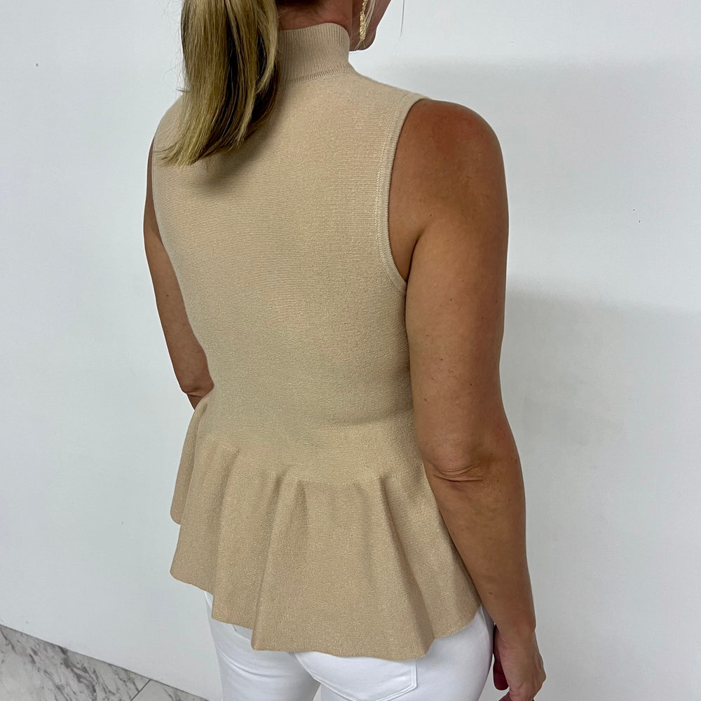 
                  
                    Polly Peplum Sweater
                  
                