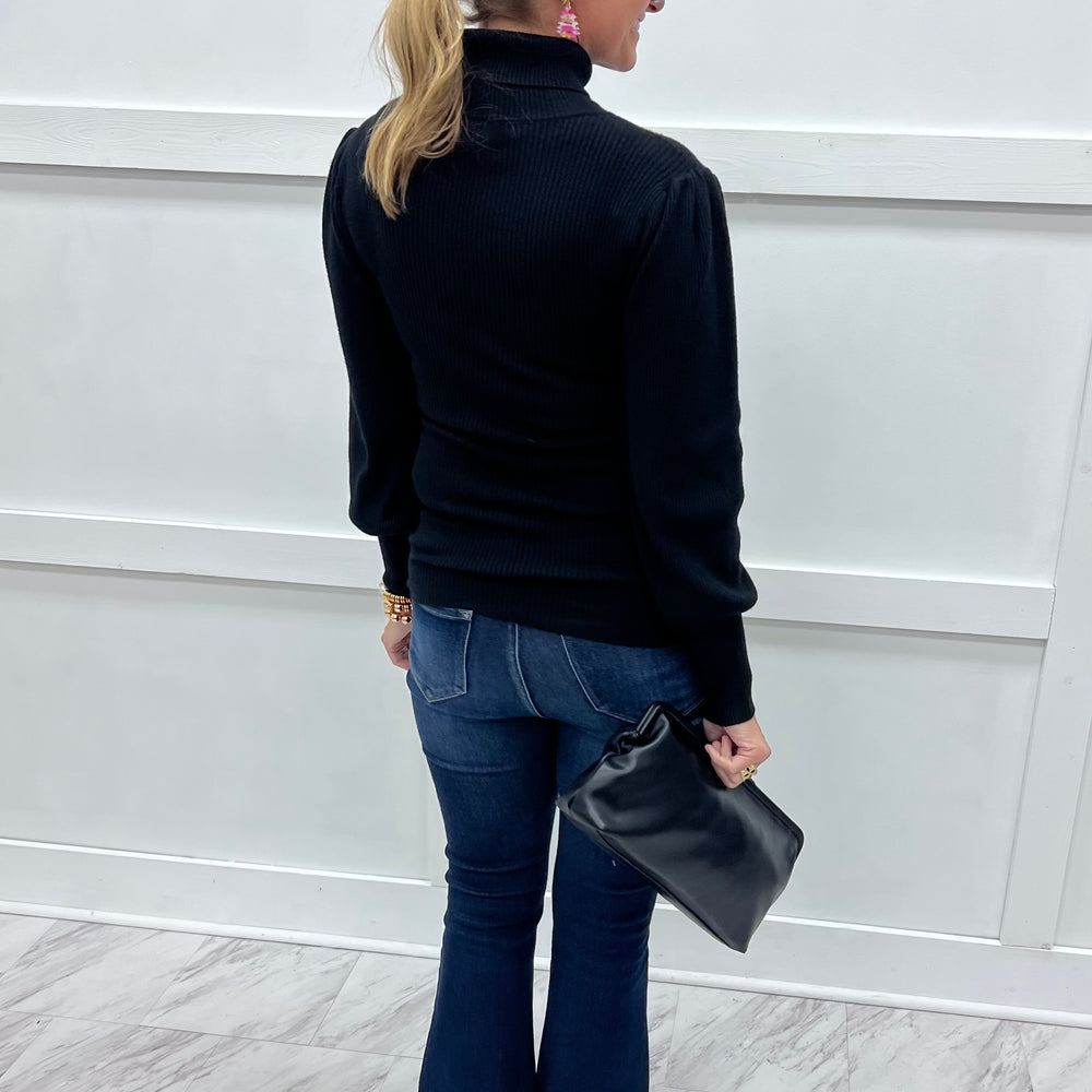 
                  
                    Hunter Ribbed Knit Turtleneck Top (Black)
                  
                