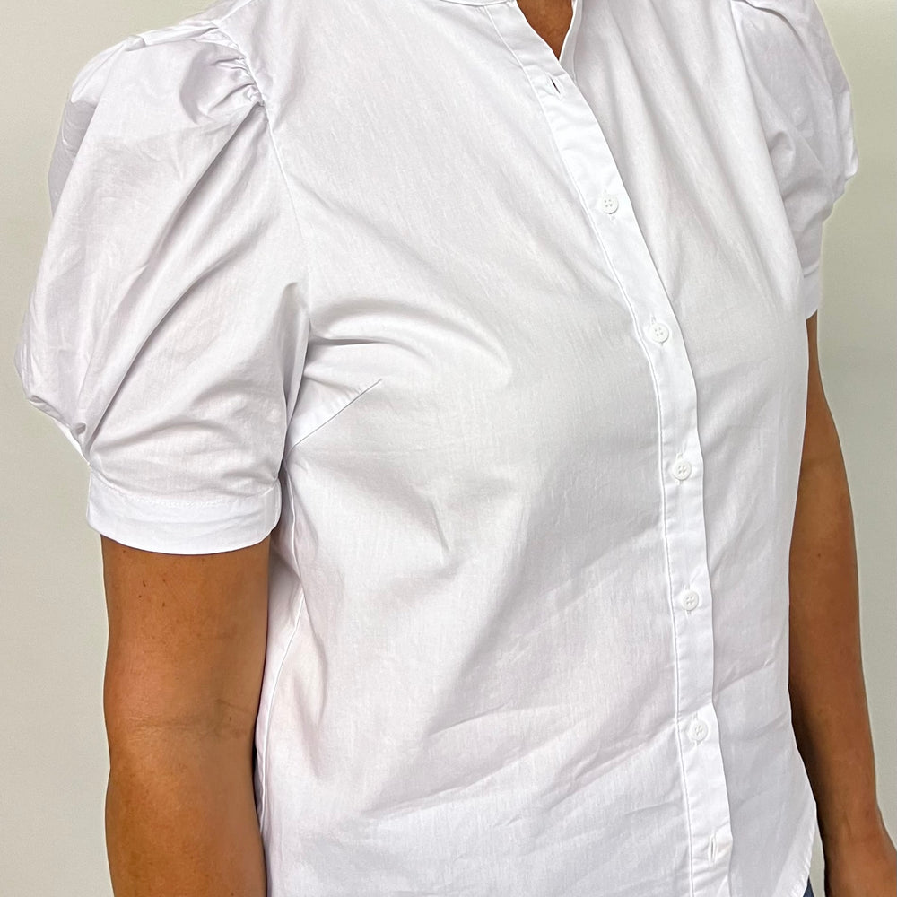 
                      
                        Winnie White Button Front Top
                      
                    