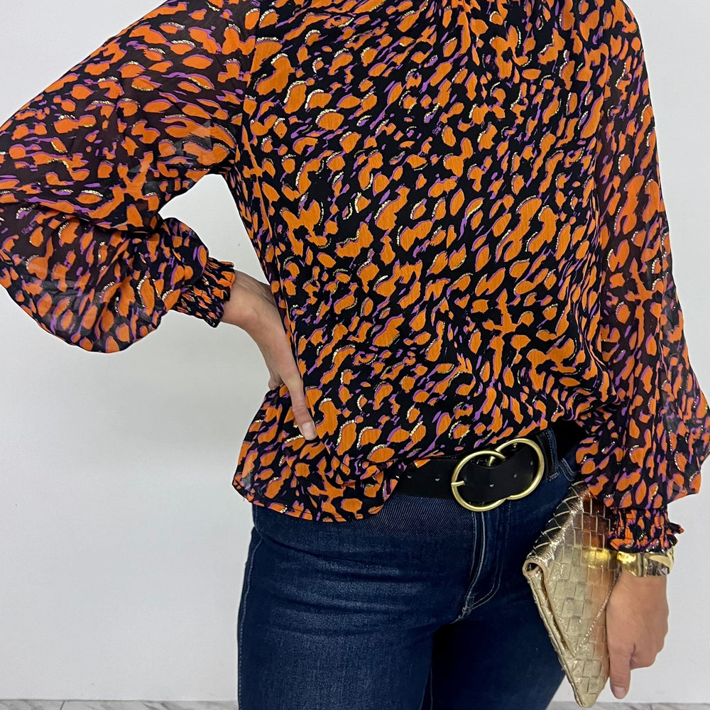 
                  
                    Chic Spots Long Sleeve Top
                  
                