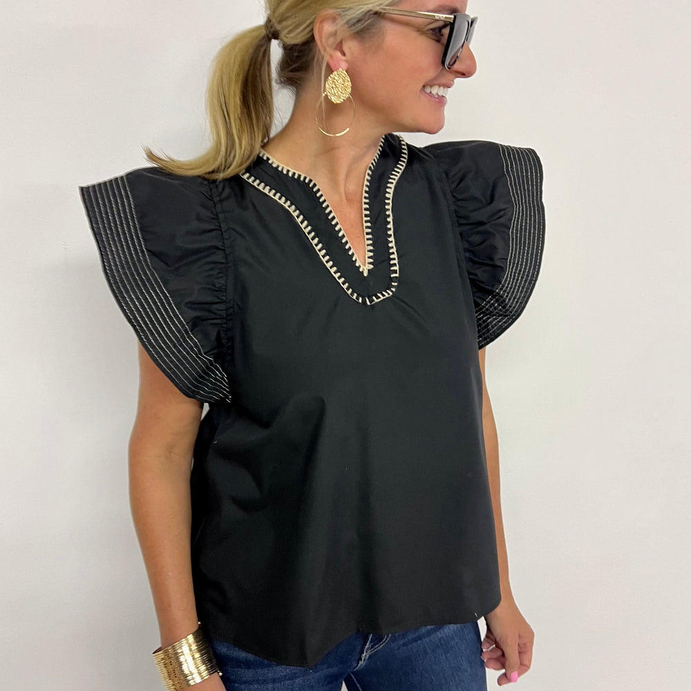 
                  
                    Icon Black Detail Top
                  
                