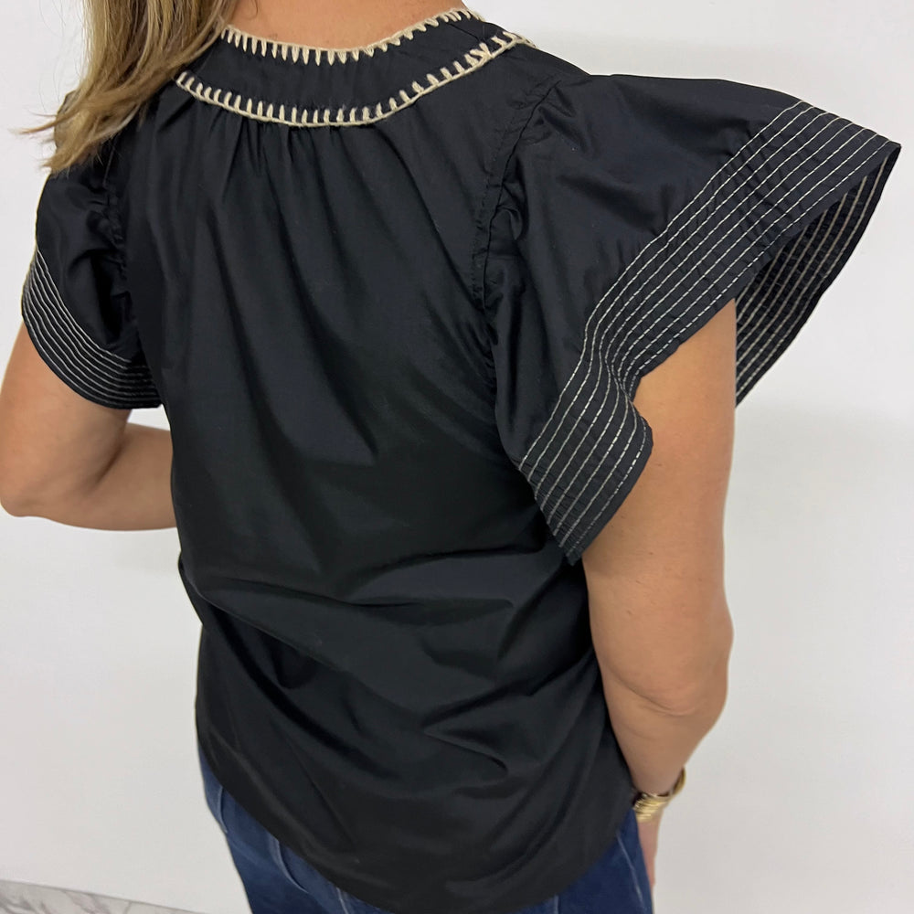 
                  
                    Icon Black Detail Top
                  
                